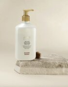 Ahava Dermud™ pomirjajoča krema za prhanje za suho in občutljivo kožo 400 ml