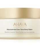 Ahava Niacinamide Even Tone Body Balm balzam za telo za osvetljevanje kože in hidratacijo 220 ml