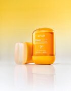 Anua K-Pop Demon Hunters Invisible Glow Finish Sunscreen zaščitna vlažilna paličica s posvetlitvenim učinkom SPF 50 18 g