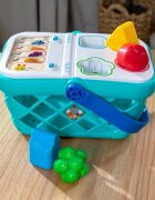 Baby Einstein Hape Magic Touch Shopping Basket aktivnostna igrača 9 m+ 1 kos