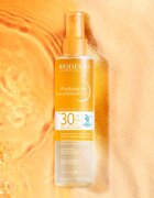 Bioderma Photoderm Eau solaire BRONZ pršilo za sončenje z bronzerjem SPF 30 200 ml