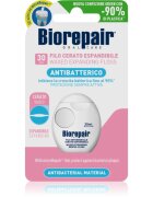 Biorepair Dental Floss Waxed Expanding voskasta dentalna nitka za občutljive dlesni Pink 30 m