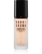 Bobbi Brown Weightless Skin Foundation SPF 15 Mini dolgoobstojni matirajoči tekoči puder z vlažilnim učinkom odtenek Warm Porcelain 13 ml