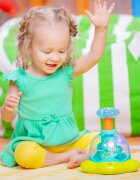 Bright Starts Press & Glow Spinner aktivnostna igrača z melodijo 6 m+ 1 kos