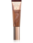 Charlotte Tilbury Beautiful Skin Foundation vlažilni tekoči puder odtenek 13 Warm 30 ml
