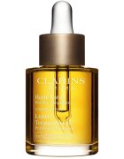 Clarins Lotus Treatment Oil regeneracijsko olje z gladilnim učinkom za dan in noč 30 ml