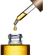 Clarins Lotus Treatment Oil regeneracijsko olje z gladilnim učinkom za dan in noč 30 ml
