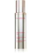 Clarins Nutri-Lumière Day revitalizacijska emulzija za obraz proti gubam in temnim madežem 50 ml