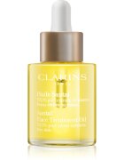 Clarins Santal Face Treatment Oil pomirjajoče in regeneracijsko olje za suho kožo 30 ml