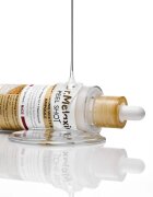 Dr. Melaxin Peel Shot Exfoliating White Rice Ampoule eksfoliacijski piling serum za posvetlitev in zgladitev kože 80 ml