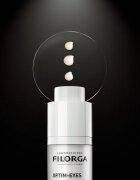 FILORGA OPTIM-EYES nega za predel okoli oči proti gubam zabuhlosti in temnim kolobarjem 15 ml