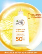 Garnier Ambre Solaire Super UV Vitamin C lahki zaščitni fluid proti temnim madežem SPF 50+ 40 ml
