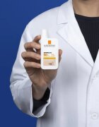 La Roche-Posay Anthelios UVMUNE 400 zaščitni tonirani fluid za obraz SPF 50+ 50 ml
