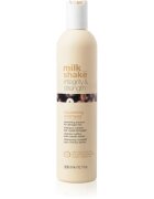 milk_shake® Integrity & Strength Nourishing Shampoo hranilni šampon za poškodovane lase 300 ml