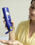 Nivea Q10 Firming losjon za učvrstitev kože za suho kožo 400 ml