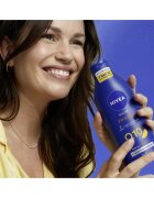 Nivea Q10 Firming losjon za učvrstitev kože za suho kožo 400 ml