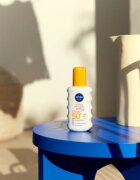 Nivea SUN Sensitive Immediate zaščitno pršilo za sončenje SPF 50+ 200 ml