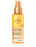 Nuxe Sun Moisturizing Protective Milky Oil For Hair zaščitno olje za lase izpostavljene soncu morski in klorirani vodi 100 ml