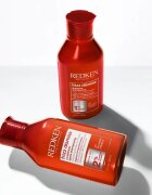 Redken Frizz Dismiss hranilni oljasti serum za neobvladljive lase 125 ml