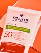 Rilastil Acnestil zaščitna matirajoča krema za obraz SPF 50+ 40 g
