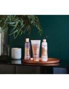 Sanctuary Spa Lily & Rose Collection vlažilni losjon za telo za suho kožo 250 ml