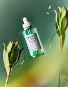 SKIN1004 Madagascar Centella Tea-Trica Relief Ampoule pomirjajoči serum za obraz za problematično kožo akne 100 ml