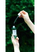 SKIN1004 Madagascar Centella Tea-Trica Relief Ampoule pomirjajoči serum za obraz za problematično kožo akne 100 ml