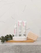 Topicrem MELA Unifying Exfoliating Bar čistilno milo z učinkom eksfoliacije za obraz in telo 150 g
