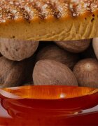 Woodwick Pumpkin Praline dišeča sveča z lesenim stenjem 275 g
