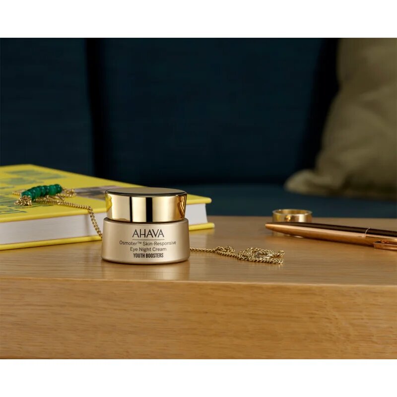 Ahava Osmoter™ Skin-Responsive posvetlitvena krema za predel okoli oči proti zabuhlosti in temnim kolobarjem 15 ml