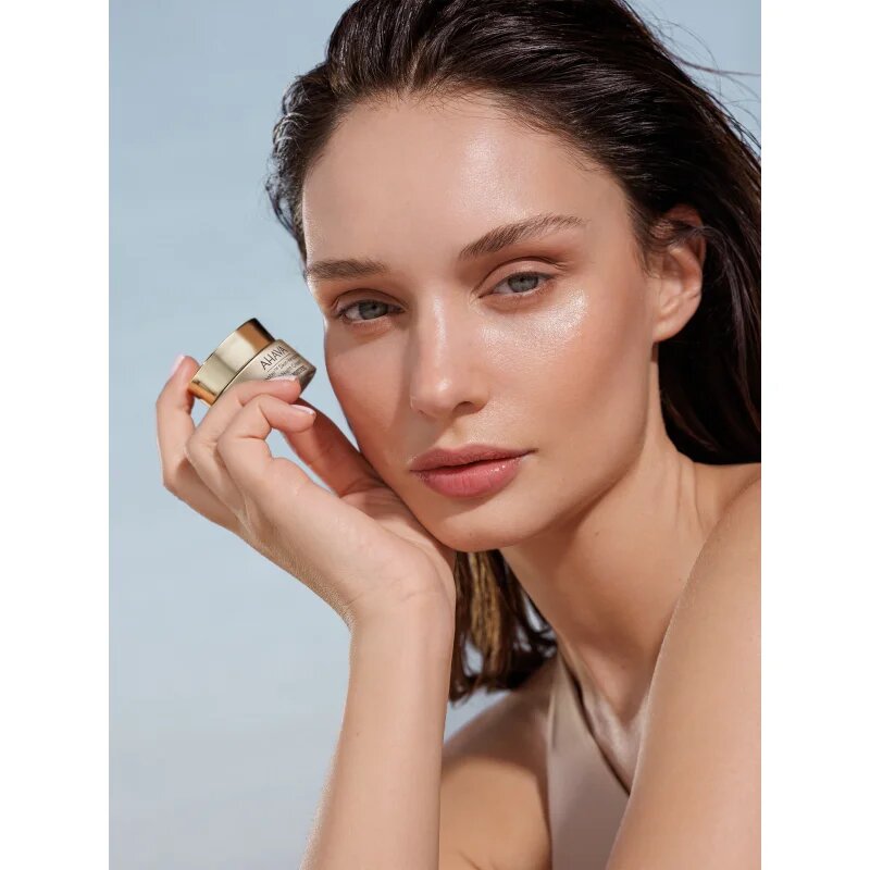 Ahava Osmoter™ Skin-Responsive posvetlitvena krema za predel okoli oči proti zabuhlosti in temnim kolobarjem 15 ml