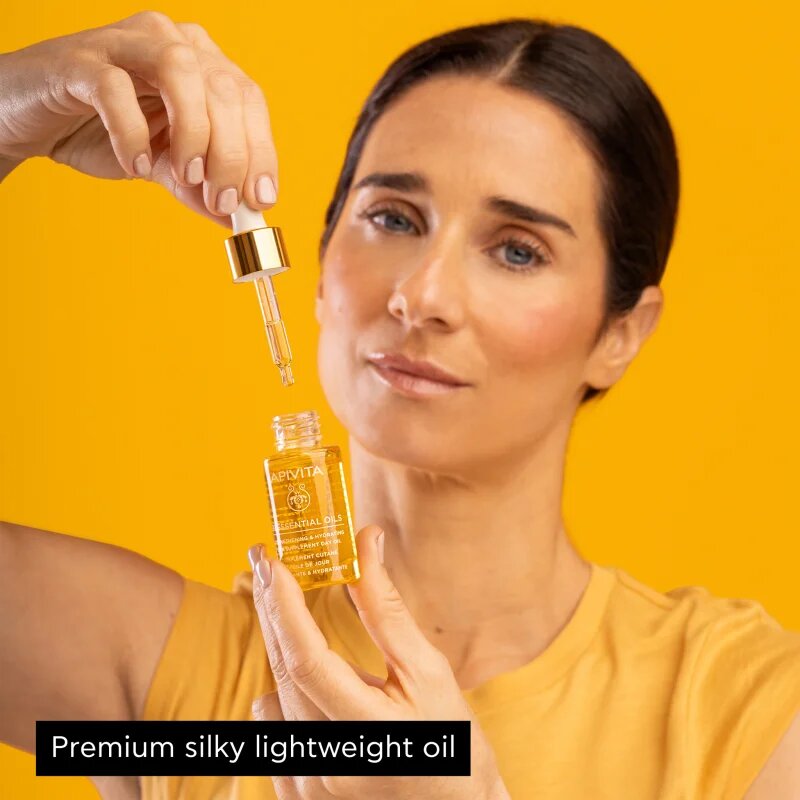 Apivita Beessential Oils Strengthening & Hydrating Day Oil posvetlitveno dnevno olje za intenzivno hidracijo 15 ml