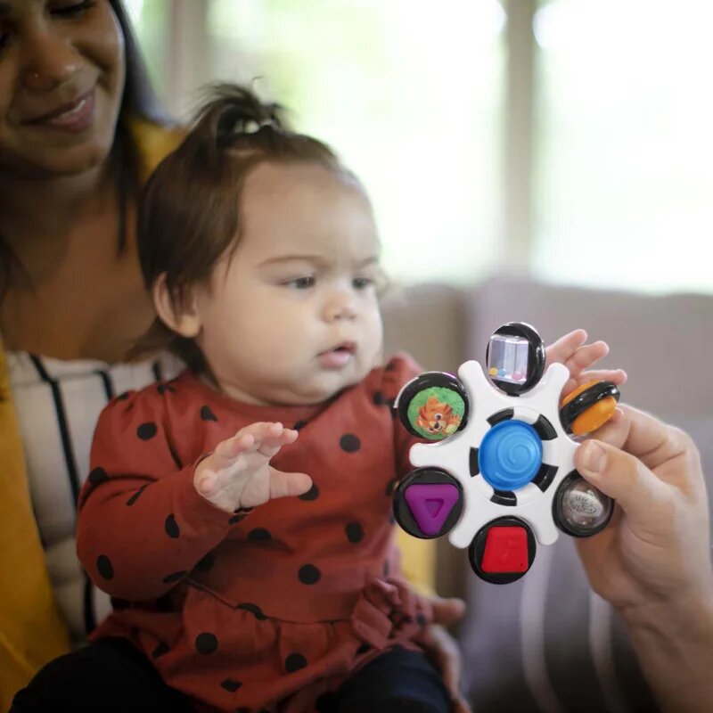 Baby Einstein Curiosity Clutch Twist & Pop aktivnostna igrača 3 m+ 1 kos