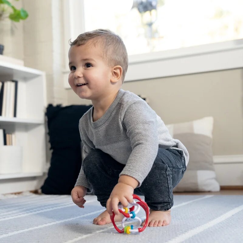 Baby Einstein Slide & Swirl™ senzorična žogica 3m+ 1 kos