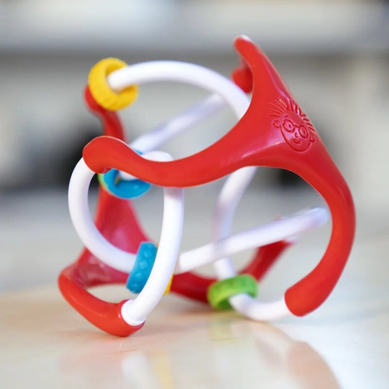 Baby Einstein Slide & Swirl™ senzorična žogica 3m+ 1 kos