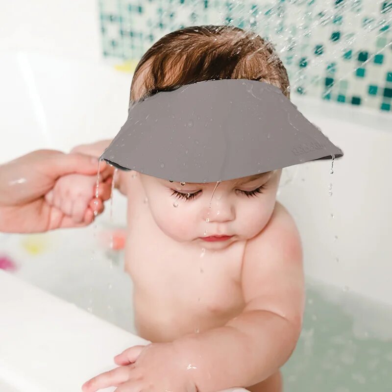 BBLÜV Käp silikonski ščitnik za umivanje las Grey 1 kos