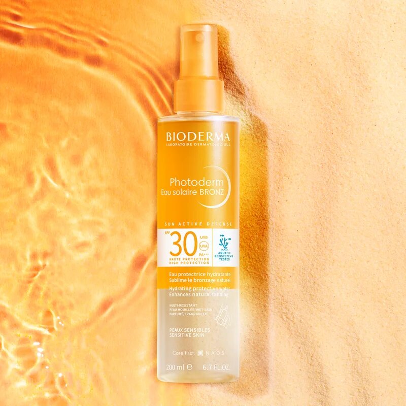 Bioderma Photoderm Eau solaire BRONZ pršilo za sončenje z bronzerjem SPF 30 200 ml