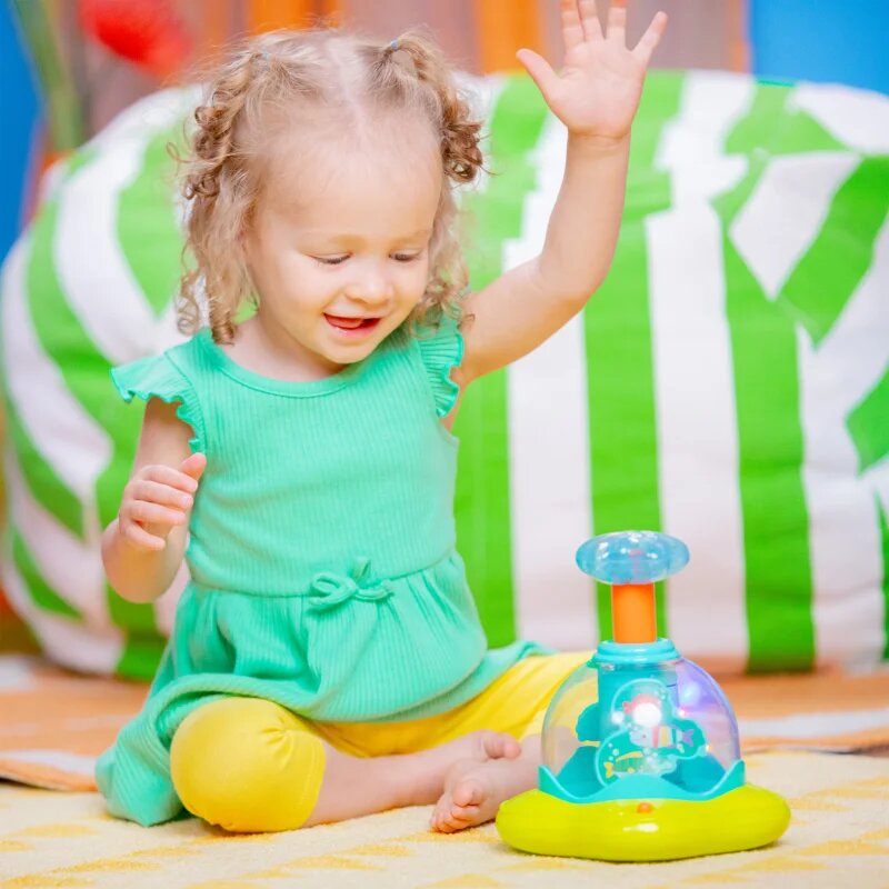 Bright Starts Press & Glow Spinner aktivnostna igrača z melodijo 6 m+ 1 kos
