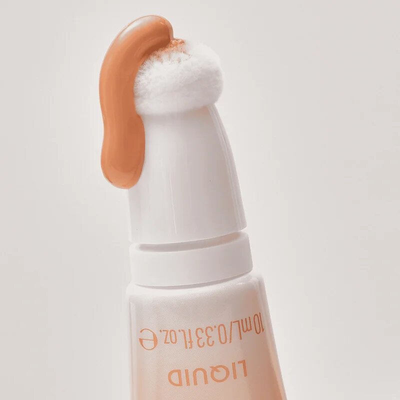 Catrice Under Eye Brightener Liquid tekoči osvetljevalec proti podočnjakom odtenek 020 Warm Nude 10 ml