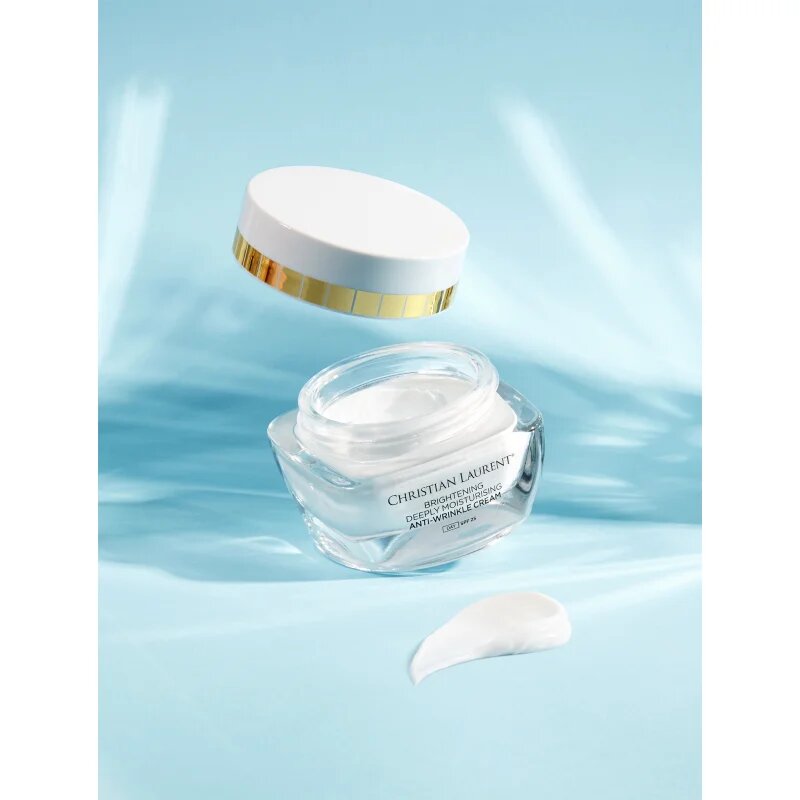 Christian Laurent Luminous Glow posvetlitvena dnevna krema proti gubam SPF 25 50 ml