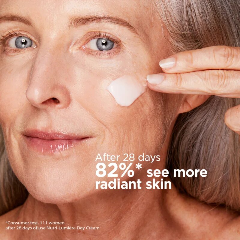 Clarins Nutri-Lumière Day revitalizacijska dnevna krema za sijoč videz 50 ml