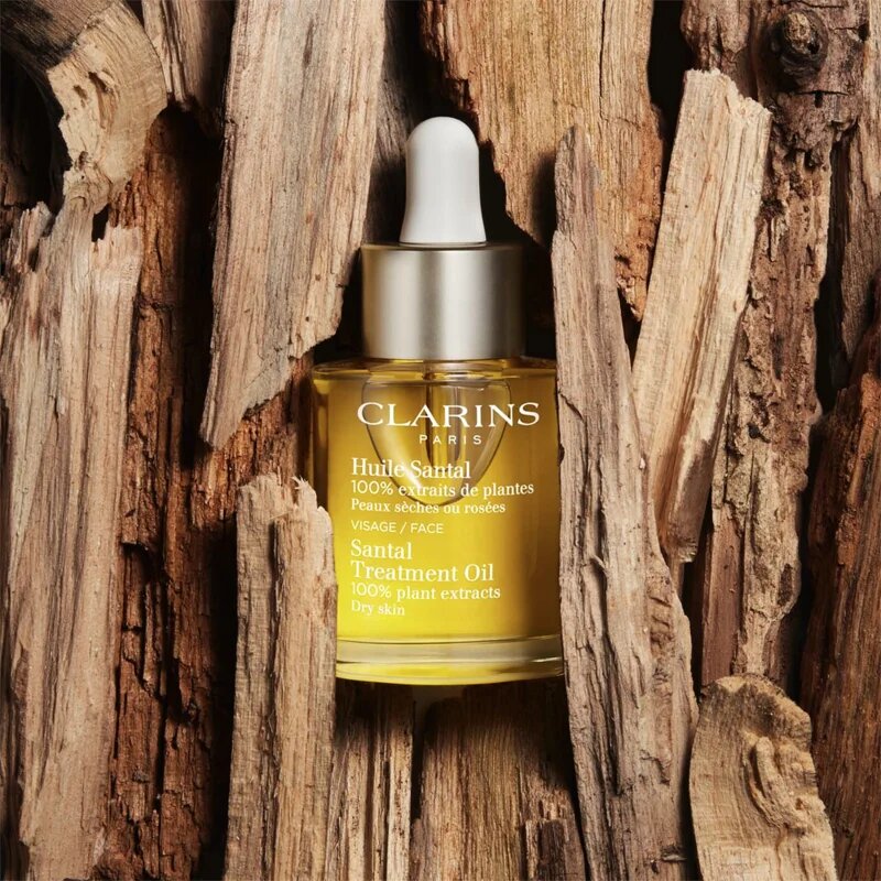 Clarins Santal Face Treatment Oil pomirjajoče in regeneracijsko olje za suho kožo 30 ml