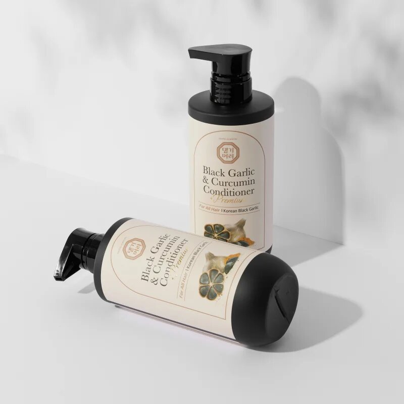 DAENG GI MEO RI Black Garlic & Curcumin Treatment negovalni balzam za gostoto las in zaščito proti lomljivosti 500 ml