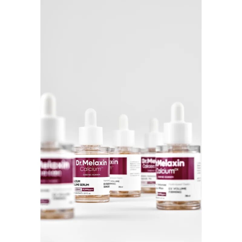 Dr. Melaxin Calcium Volume Serum lifting serum za obraz za obraz in predel okoli oči 30 ml