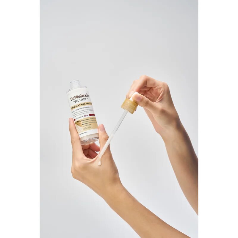 Dr. Melaxin Peel Shot Exfoliating White Rice Ampoule eksfoliacijski piling serum za posvetlitev in zgladitev kože 80 ml
