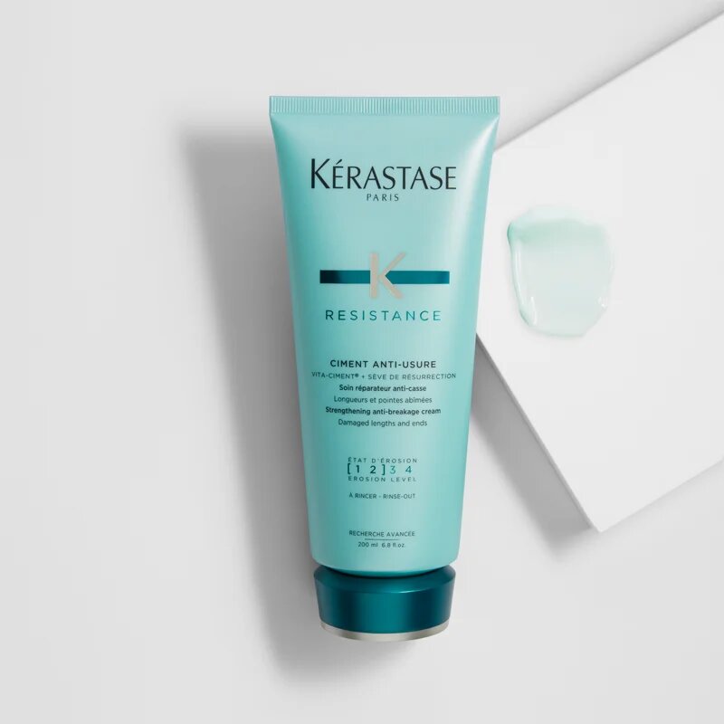 Kérastase Résistance Ciment Anti-Usure lahka intenzivna nega s krepilnimi učinki za oslabljene in rahlo poškodovane lase in razcepljene konice 200 ml