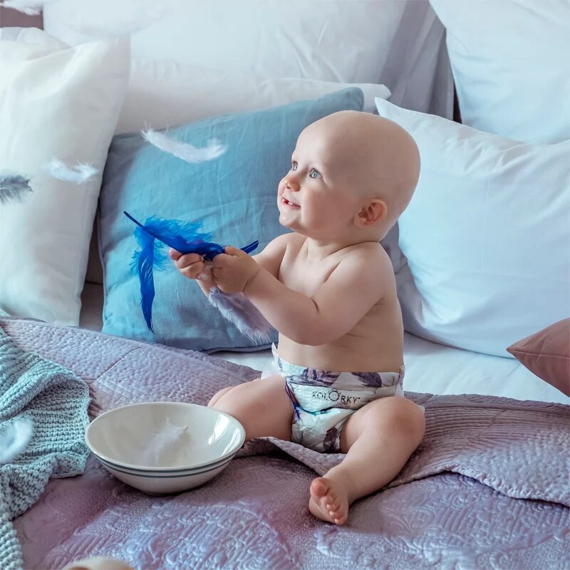 Kolorky Day Feathers ekološke plenice za enkratno uporabo velikost L 8-13 Kg 19 kos