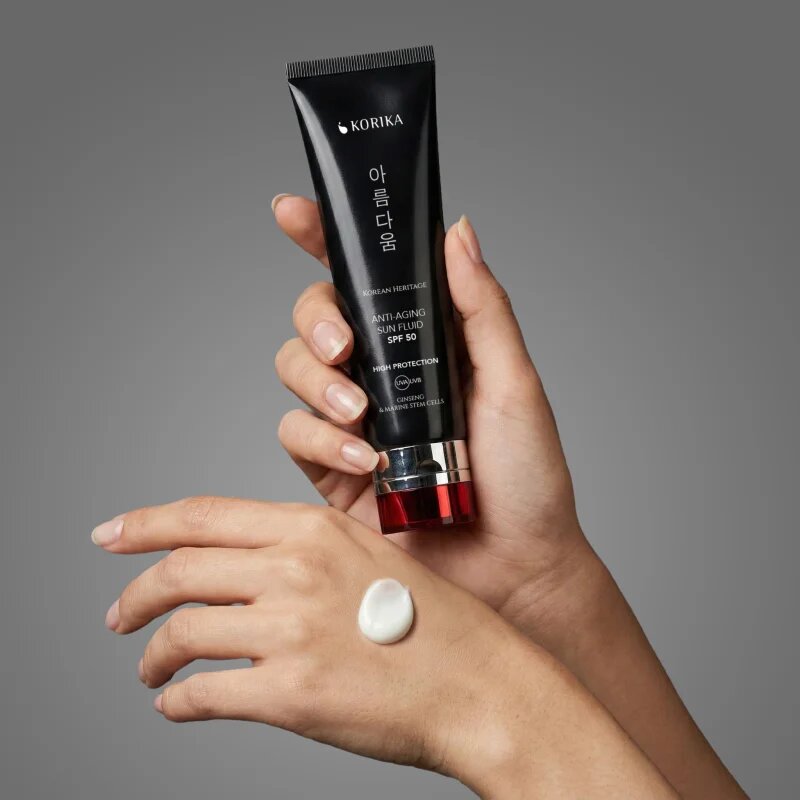 KORIKA Korean Heritage Ginseng & Marine Stem Cells Anti-aging Sun Fluid SPF 50 zaščitni fluid proti staranju kože SPF 50 50 ml