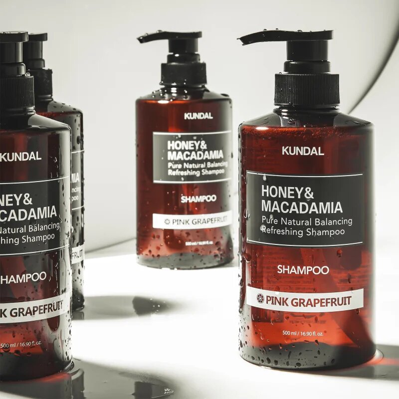 KUNDAL Honey & Macadamia Pink Grapefruit naravni šampon za suhe in poškodovane lase 500 ml