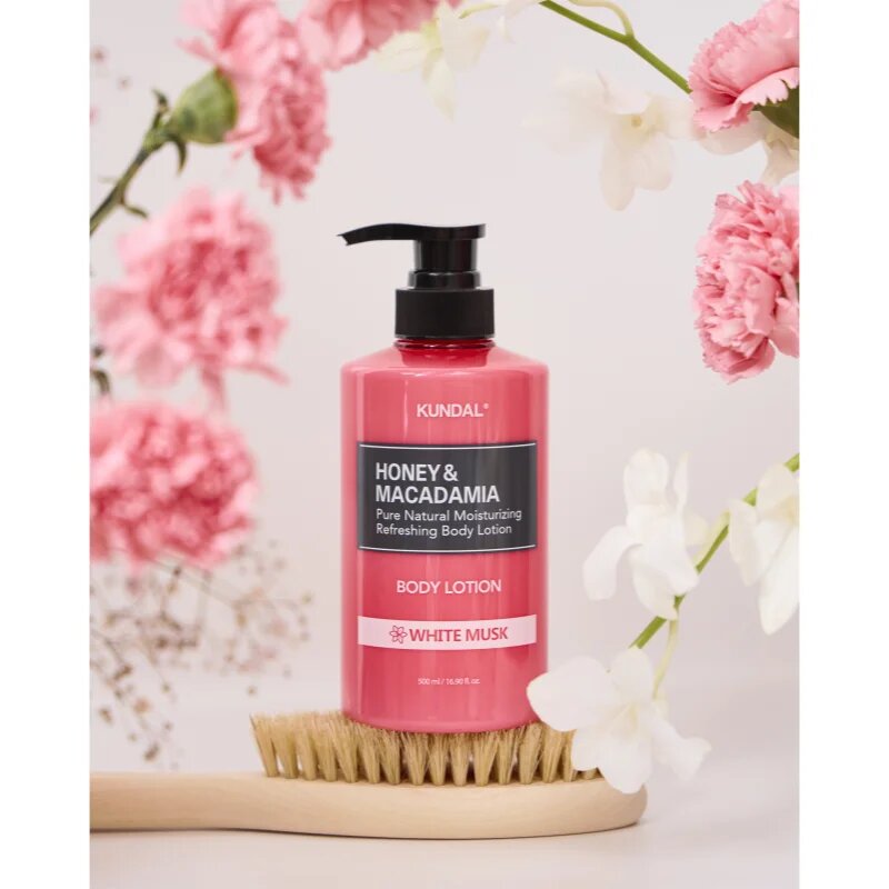 KUNDAL Honey & Macadamia White Musk hranilni losjon za telo z vlažilnim učinkom 500 ml